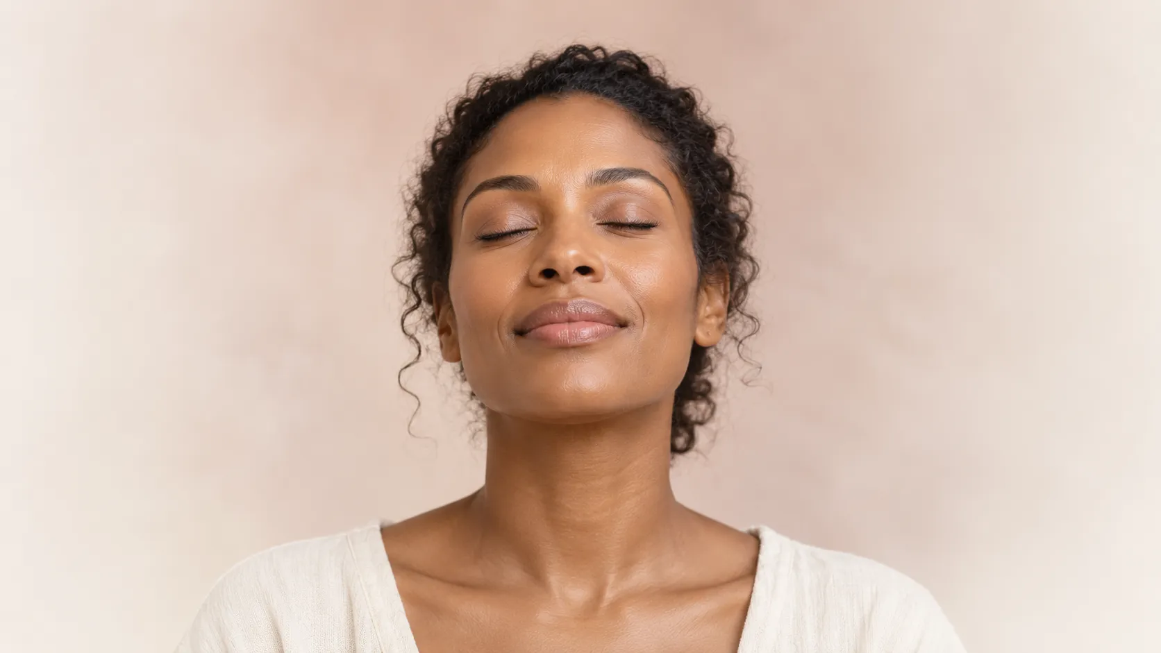 Woman with natural skin and a relaxed expression